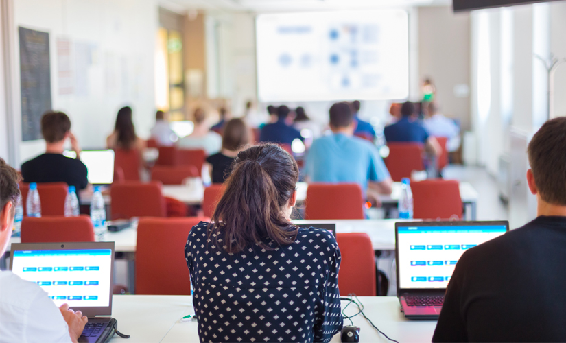 people sitting at computers for training 